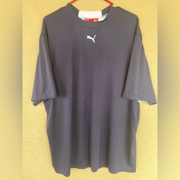 Blue and white lightweight short sleeve puma shirt. Size is an XL. - Picture 1 of 4